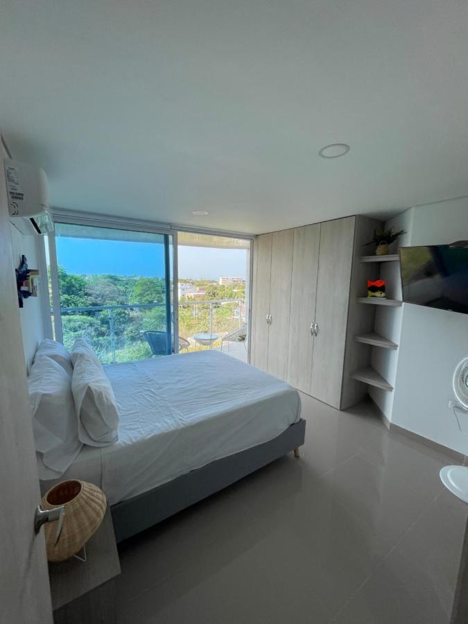 Апартаменты Infinity Blue - Playa Dormida Санта-Марта Экстерьер фото